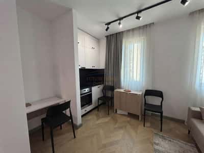 Qera, Garsoniere, Mozaiku i Tiranes, Tiranë
